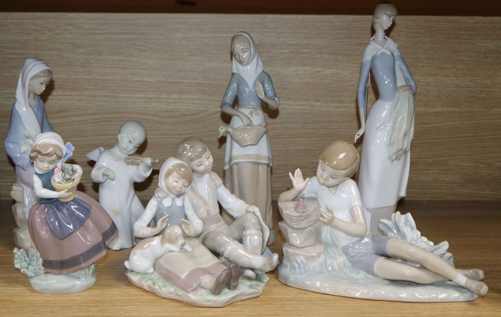 Five Lladro figures, a Nao figure and a Miquel Requena figure,